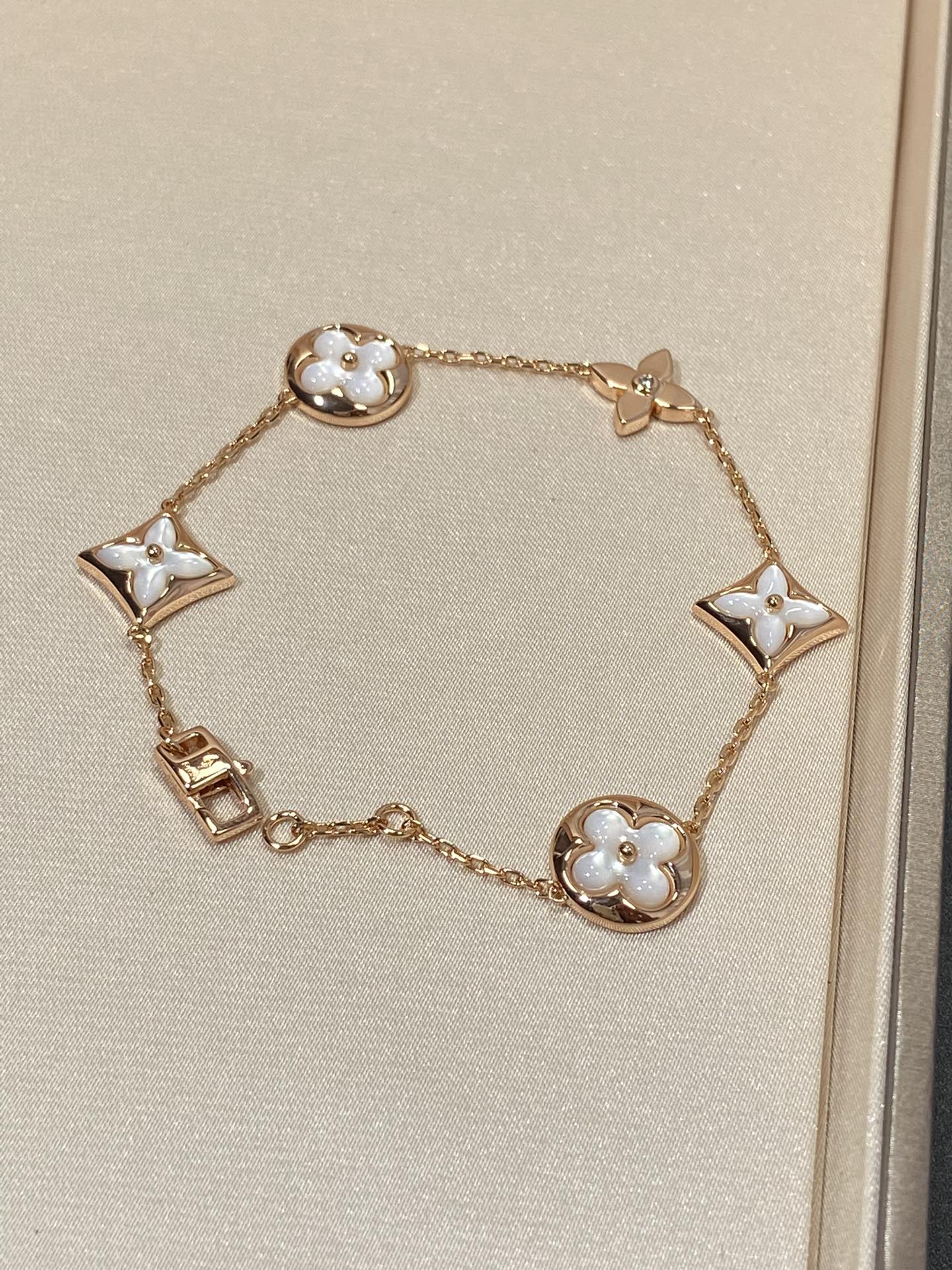 [Olivia JW]STAR AND SUN 5 MOTIF MOP PINK GOLD BRACELET