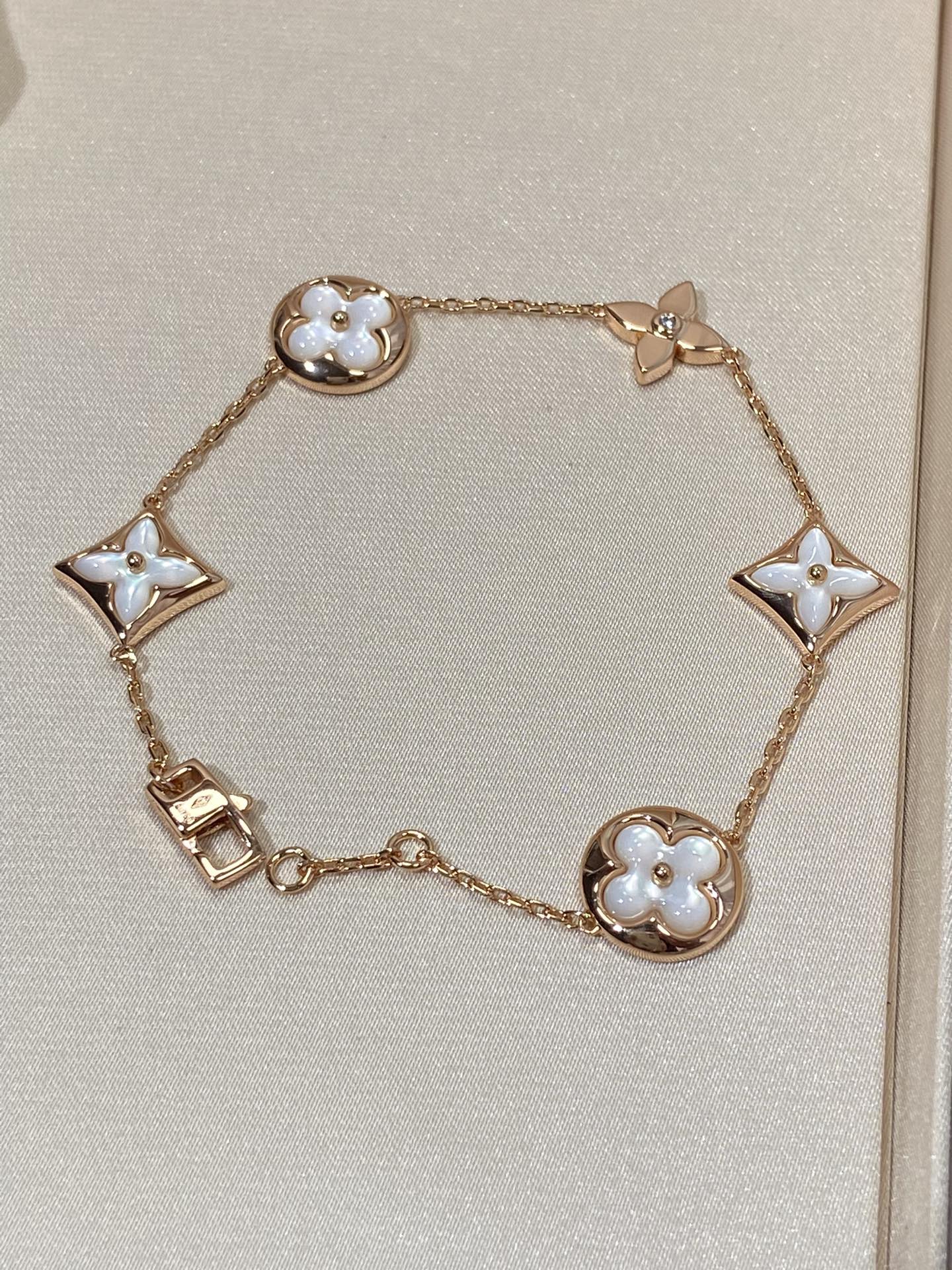 [Olivia JW]STAR AND SUN 5 MOTIF MOP PINK GOLD BRACELET