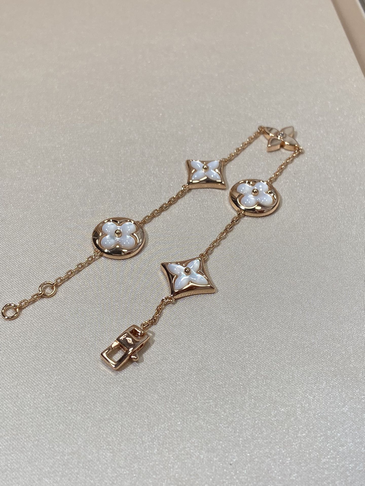 [Everoly JW]STAR AND SUN 5 MOTIF MOP PINK GOLD BRACELET