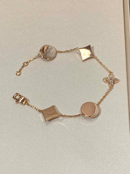 [Everoly JW]STAR AND SUN 5 MOTIF MOP PINK GOLD BRACELET